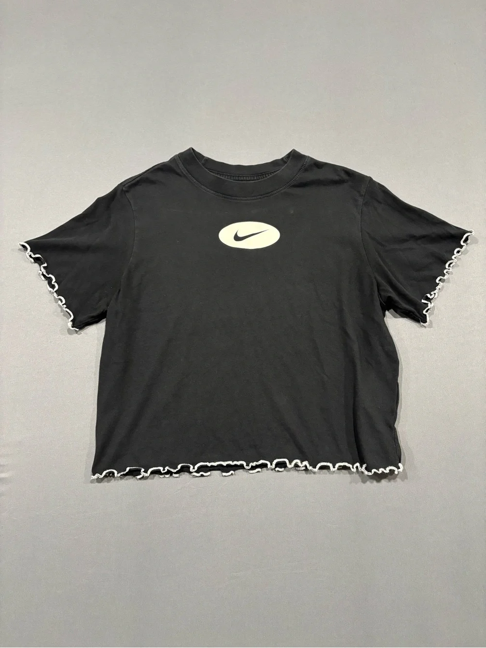 Nike Black Cropped Tee with White Swoosh and Lettuce Hem
